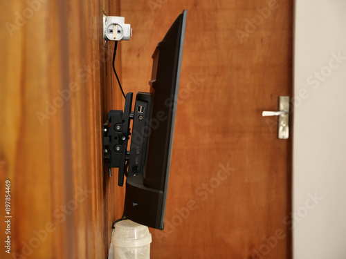 Canvas Print Bracket mounting for hanging tv set on wall, side view