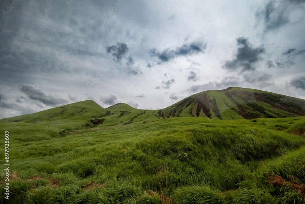 Fototapeta premium Aso mountain landscape with clouds