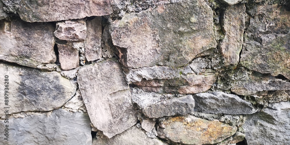 Obraz premium shapeless ancient brick wall.