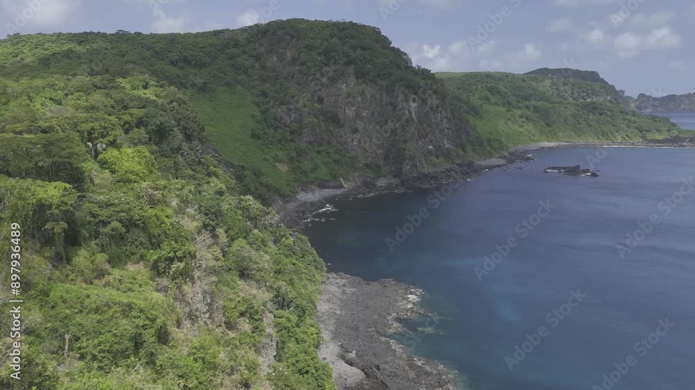 Drone slowly ascends overlooking Baia dos Golfinhos in Fernando de Noronha, Pernambuco, Brazil Drone slowly ascends overlooking Baia dos Golfinhos in Fernando de Noronha, Pernambuco, Brazil