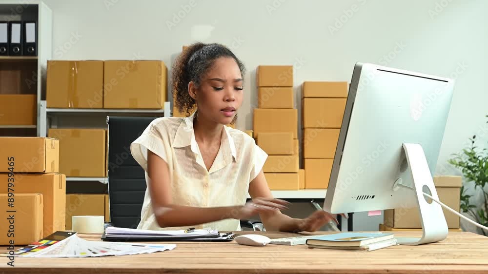Young woman prepare parcel box woman is stressed, bored, and overthinking from working and standing check online orders Young woman prepare parcel box woman is stressed, bored, and overthinking from working and standing check online orders