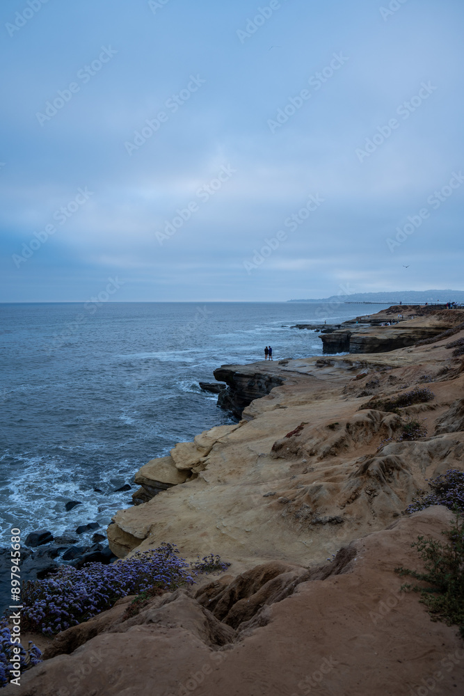 Pacific coast in California, San Diego city, Sunset Cliffs beach, sunsets over the ocean, summer evening, cliffs on the shore Pacific coast in California, San Diego city, Sunset Cliffs beach, sunsets over the ocean, summer evening, cliffs on the shore