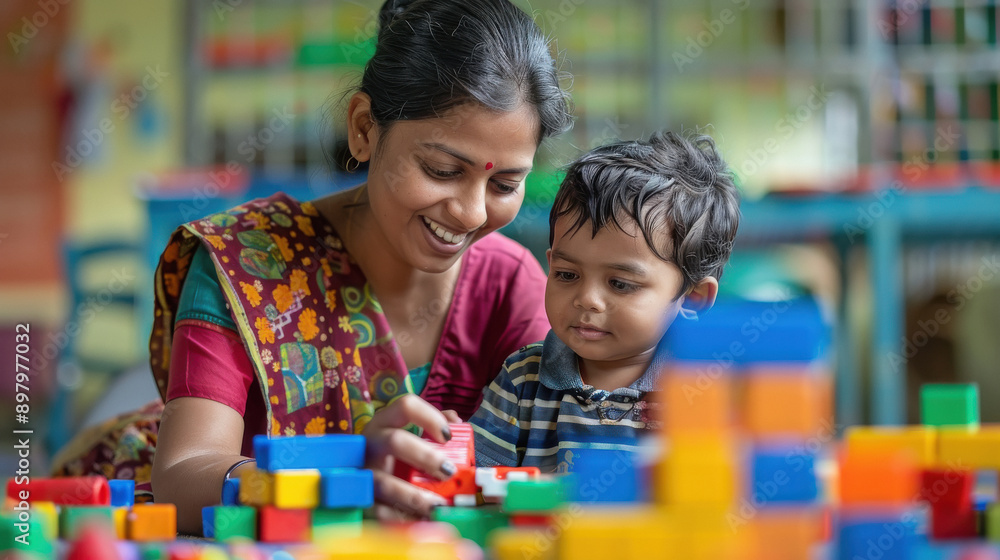 Indian mother and boy play with toys block Indian mother and boy play with toys block