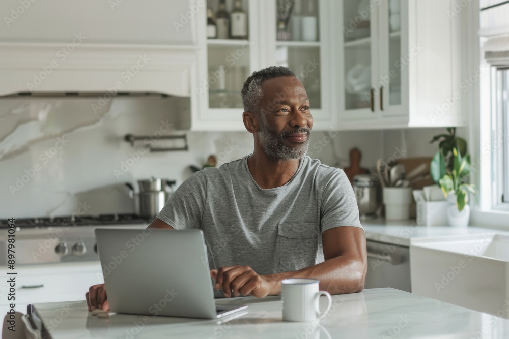 young handsome man working on laptop young handsome man working on laptop