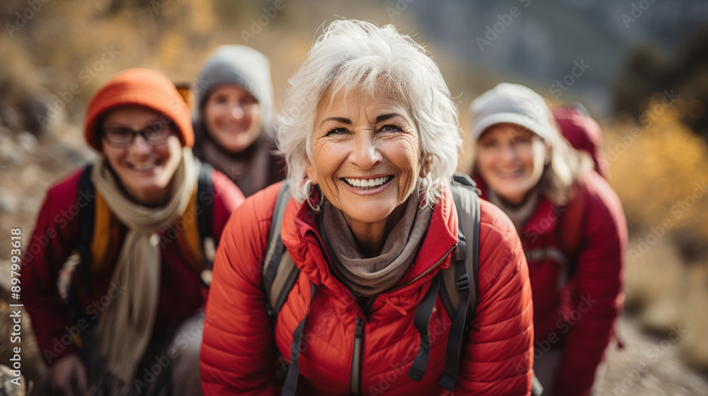 active seniors, group of retired women hiking, closeup smiling female portrait with white hair, photography. active seniors, group of retired women hiking, closeup smiling female portrait with white hair, photography.