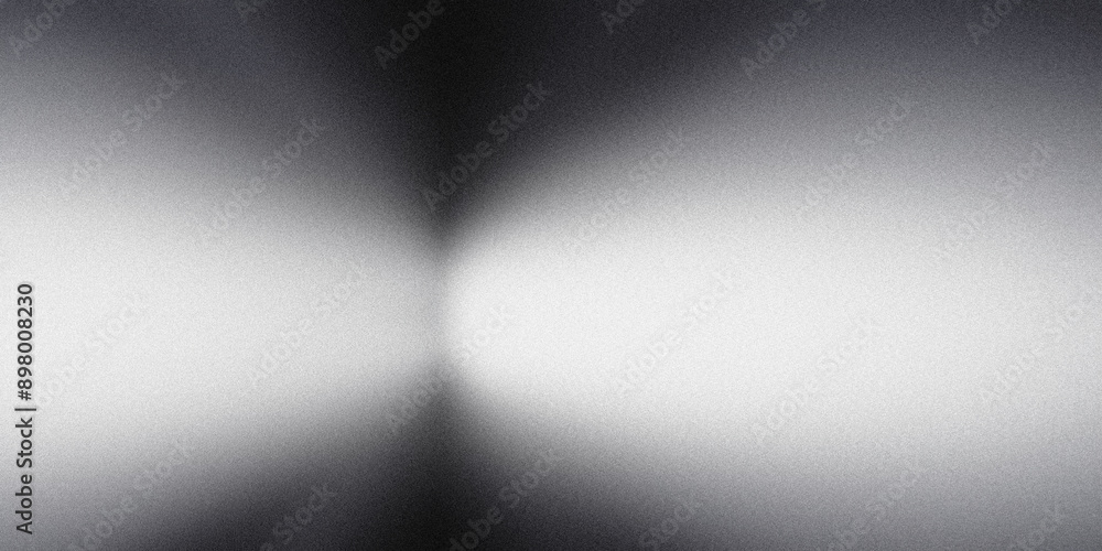 Grainy texture gradient background fading from black to white Grainy texture gradient background fading from black to white