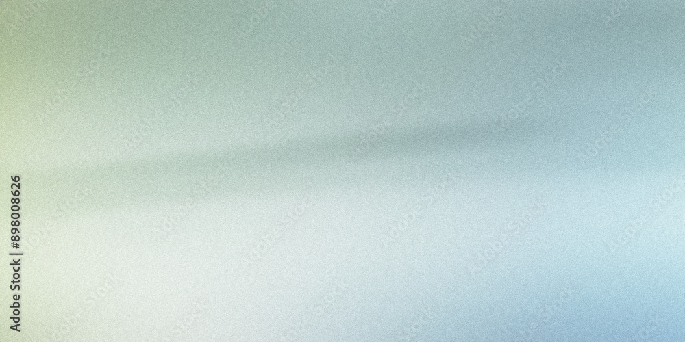 Obraz premium Subtle grainy texture on a light blue and green gradient background