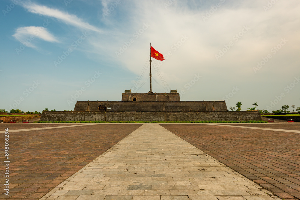 Fototapeta premium Ngo Mon square with the flag tower Ky Dai in the Citadel - the Imperial Place in Hue city, Vietnam