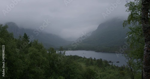 Summer in Norway. Beautiful valley Innerdalen, lake Innerdalsvatna and mountain Innerdalstårnet. photo