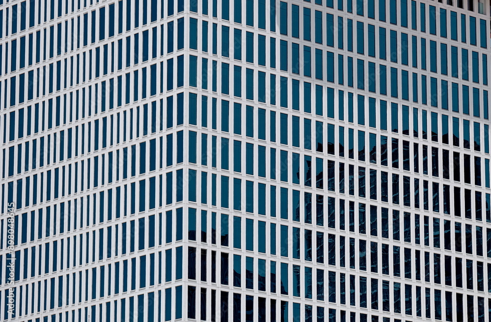 Modern building features unitized strip window facade Modern building features unitized strip window facade