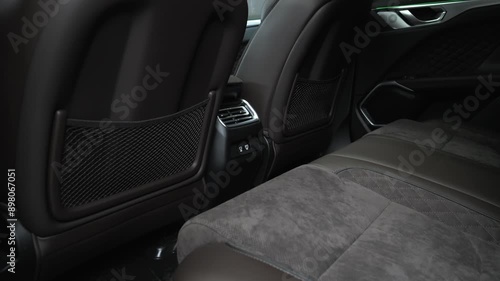 Shooting a car interior in a dark studio, no one around, camera moving slowly