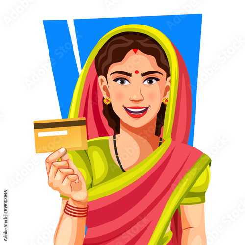 Happy Indian rural woman showing debit or credit card to promote making online payment with debit card in an agricultural field. Concept of payment card, online banking, farmer, modern, debit card