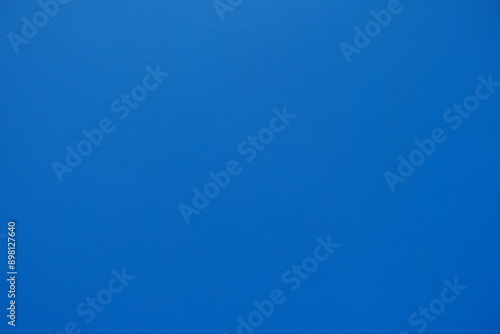 Texture of bright electric blue painted wall