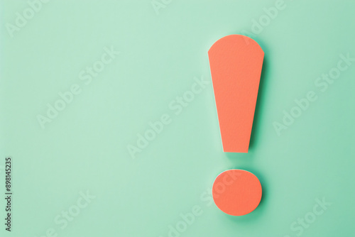 a red exclamation mark on a green background