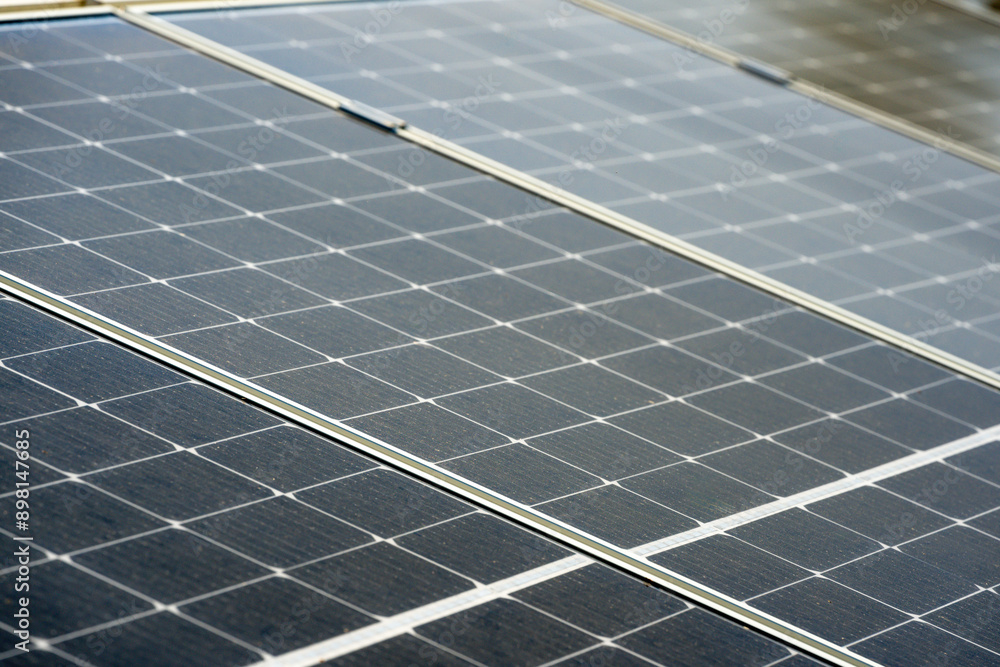 Close-up of eco technology of solar cell farm power plant. Solar cell panels in a photovoltaic power plant. Sustainable energy concept Close-up of eco technology of solar cell farm power plant. Solar cell panels in a photovoltaic power plant. Sustainable energy concept
