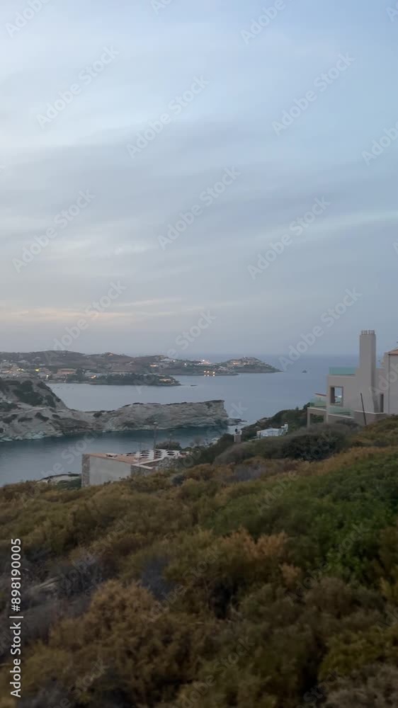 View of Agia Pelagia resort in the mountains of Crete in Greece at sunset. Mades, Ligaria. View of Agia Pelagia resort in the mountains of Crete in Greece at sunset. Mades, Ligaria.