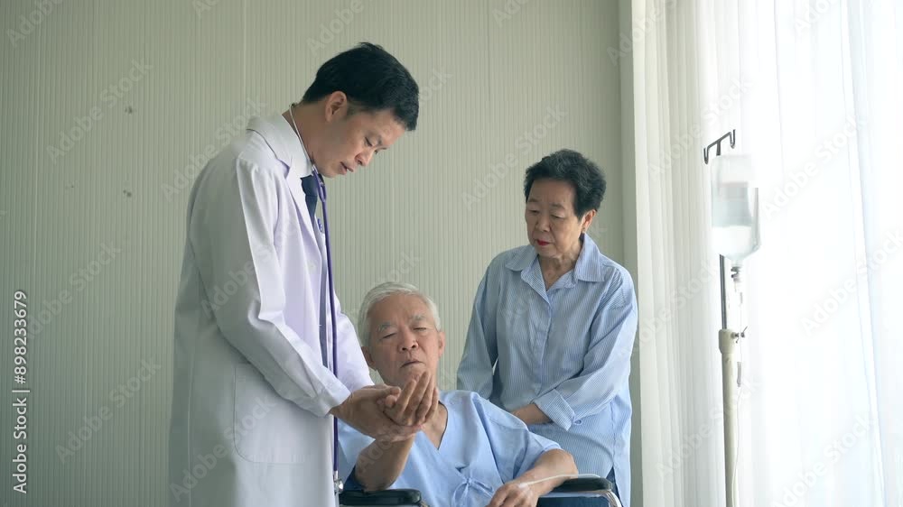 Asian senior couple with doctor in hospital bad new husband wife life health insurance Asian senior couple with doctor in hospital bad new husband wife life health insurance