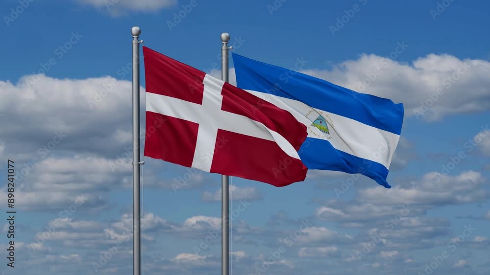 Nicaragua and Denmark flags flying together, video concept of the relationship, two country relations concept Nicaragua and Denmark flags flying together, video concept of the relationship, two country relations concept