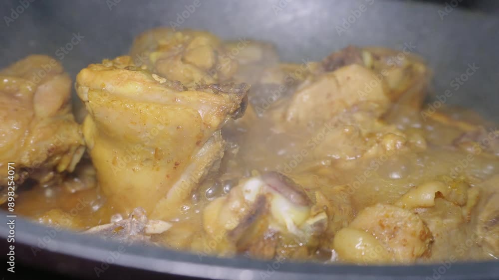 the process of covering the chicken in yellow spices. This process leaves the chicken that has been coated in spices for hours so that the spices are absorbed, so that when fried it tastes delicious the process of covering the chicken in yellow spices. This process leaves the chicken that has been coated in spices for hours so that the spices are absorbed, so that when fried it tastes delicious
