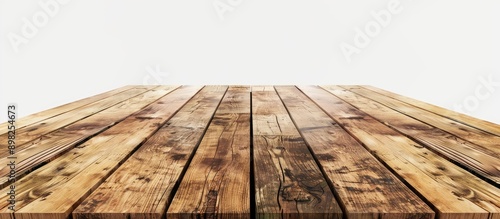 Blank wooden tabletop against a white background made as a mockup for design purposes with copy space image available
