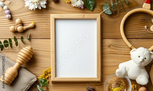 A rustic wooden frame surrounded by baby toys and decor providin photo