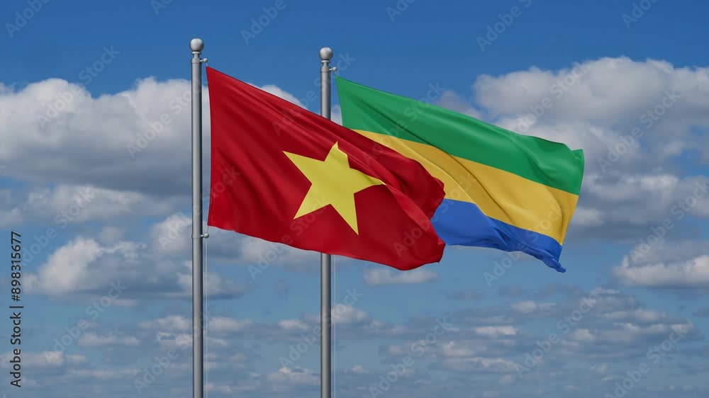 Gabon and Vietnam flags flying together, video concept of the relationship, two country relations concept Gabon and Vietnam flags flying together, video concept of the relationship, two country relations concept