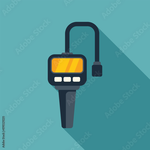 Digital clamp meter measuring electricity consumption with long shadow on turquoise background