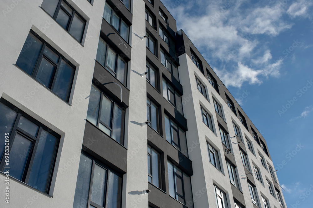 Newly built houses. Modern urban architecture. A group of newly built houses. Residential complex. Campus. Real estate. Newly built houses. Modern urban architecture. A group of newly built houses. Residential complex. Campus. Real estate.