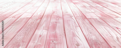 Pale pink wooden floors backdrop, creating a charming and delicate background for your website or wallpaper designs with space for text or graphics.