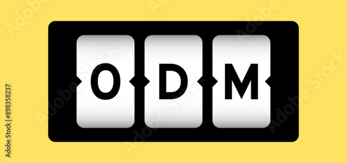 Black color in word ODM (Abbreviation of Original design manufacturer) on slot banner with yellow color background