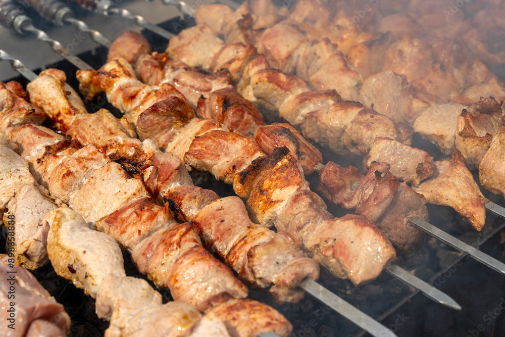 Kebab skewer meat dish. BBQ meat on grill. Kebab skewer meat dish. BBQ meat on grill.
