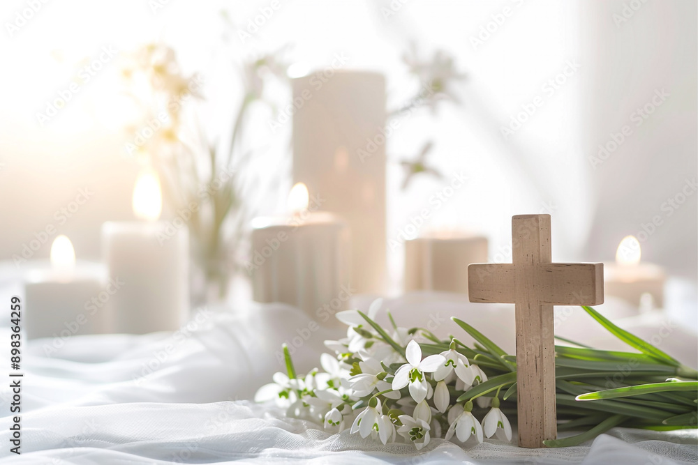 Christian background, banner with wooden cross, candles and spring flowers - snowdrops, on light background. For Christian publications and design Christian background, banner with wooden cross, candles and spring flowers - snowdrops, on light background. For Christian publications and design