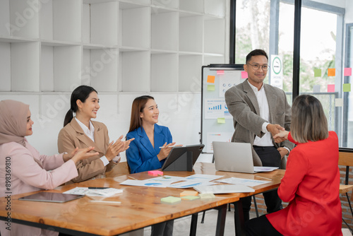 Asia business meeting   consultations of business people in the company s meeting room. 