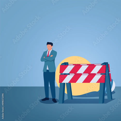 A man stands frustrated in front of a blockade of idea lights, an illustration of a fixed mindset.