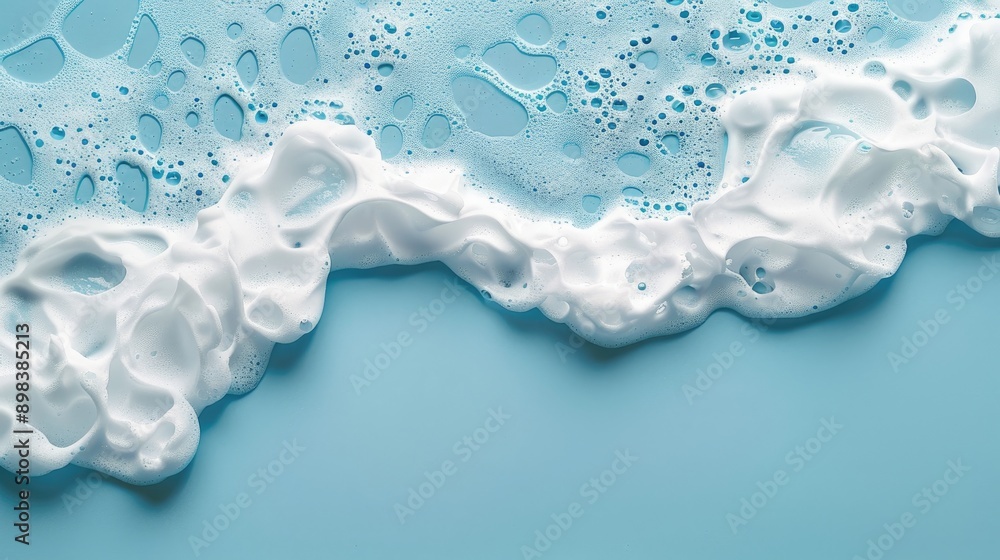 Foaming on blue surface with space for text