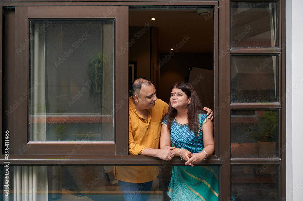 Indian mature couple enjoying time together at home Indian mature couple enjoying time together at home