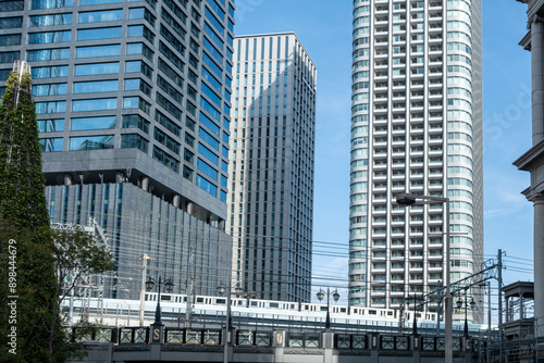 Wallpaper Mural Tokyo city elevated metro train on bridge and skyscrapers, Japan Torontodigital.ca
