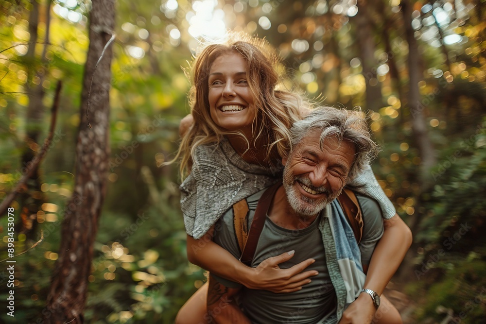 Fototapeta premium An elderly husband gives his wife a piggyback ride during outdoor exercise, symbolizing their active lifestyle and strong bond. This image captures the joy and love shared between the senior couple as