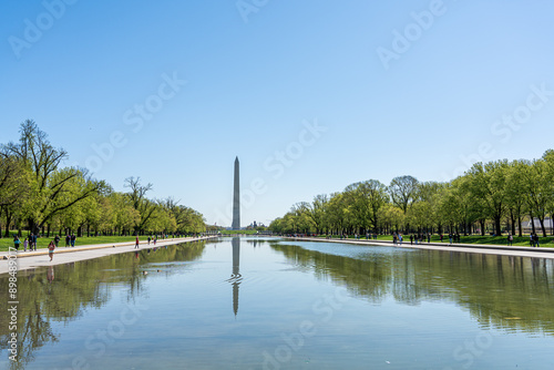 Obraz na płótnie WASHINGTON, D.C. - April 10, 2023 : View of Washington Monument from the Lincoln Memorial in Washington, D.C. full of people during spring w salonie