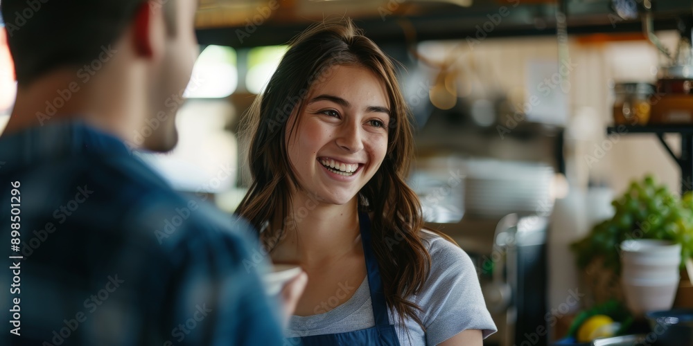Restaurant server serving meals, healthy salad, and smiling. A hospitality worker who laughs and offers diet lunches and dinners. Restaurant server serving meals, healthy salad, and smiling. A hospitality worker who laughs and offers diet lunches and dinners.
