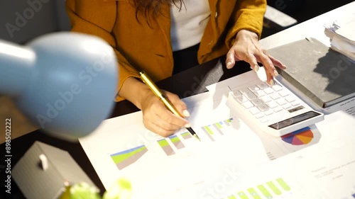 Business women  in the night office working overtime are stressed by overwork and worrying about deadlines.