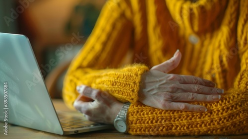 Laptop and woman with wrist ache, injury, desk overwork, sprain hand or joint. Computer-using woman, entrepreneur, or freelancer with carpal tunnel syndrome or muscle tightness photo