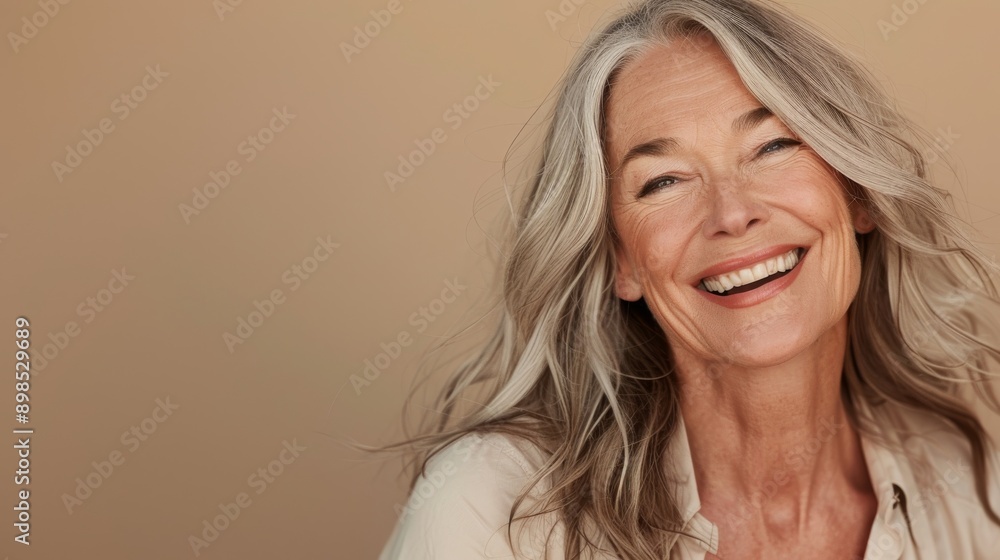 A healthy older woman with healthy hair and glowing skin A healthy older woman with healthy hair and glowing skin
