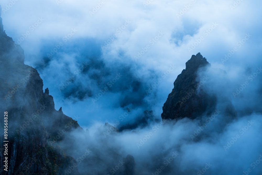 Mountain, Cliffs and Clouds. Dramatic Landscape. Pico Do Arieiro. Madeira, Portugal. Mountain, Cliffs and Clouds. Dramatic Landscape. Pico Do Arieiro. Madeira, Portugal.