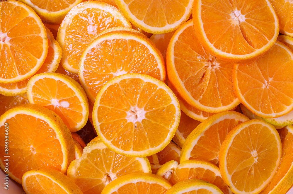 slices of citrus fruits - oranges Orange fruit pattern. Healthy food background slices of citrus fruits - oranges Orange fruit pattern. Healthy food background