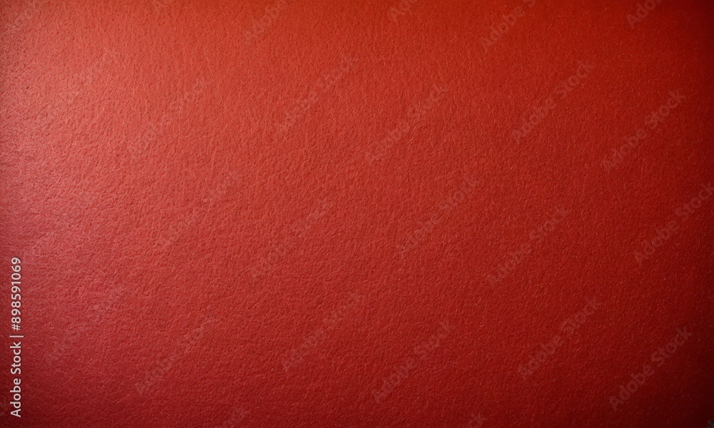Fototapeta premium close-up of a red wall with a textured surface.