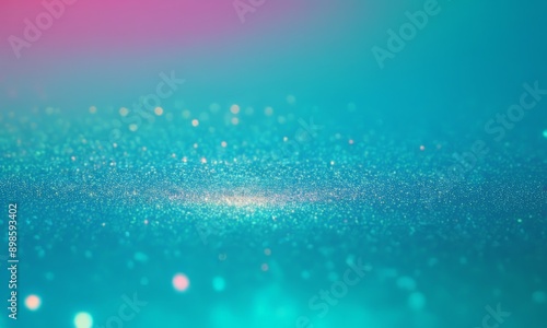 blurry photo of a blue background with a pattern of small white dots or lights, resembling a glittery or sparkly effect. © Nipon