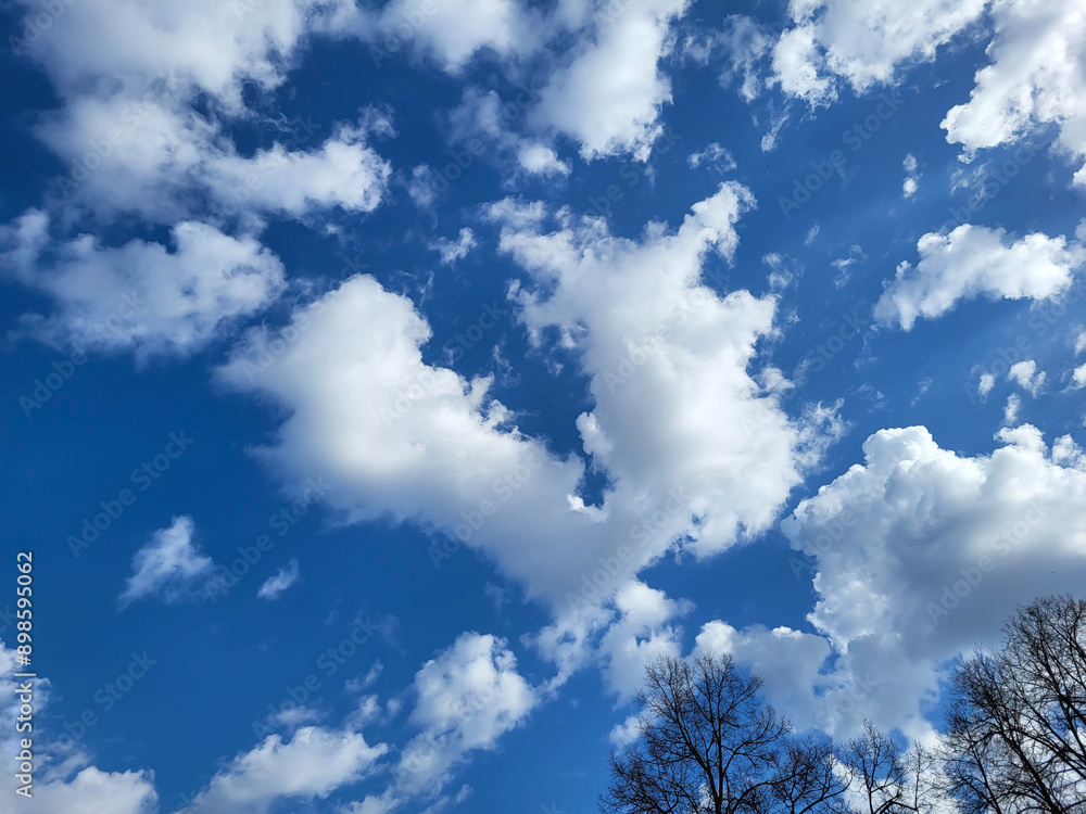 Beautiful blue sky and feathery white clouds nice bright day