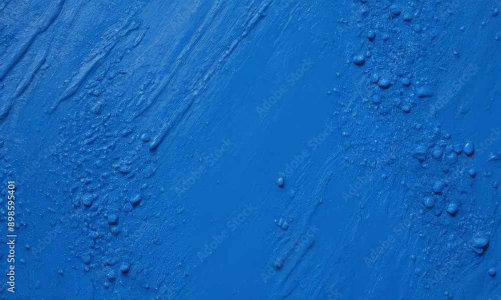 close-up of a blue surface with a textured, speckled appearance. close-up of a blue surface with a textured, speckled appearance.