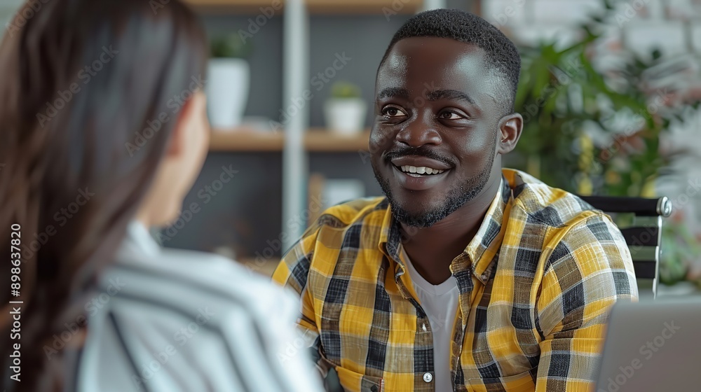 Close up view of the face of a young middle eastern Muslim man smiling kindly. Close up view of the face of a young middle eastern Muslim man smiling kindly.
